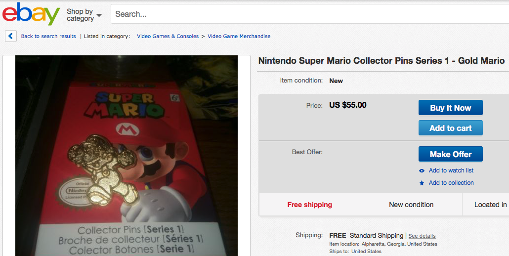 A rare Gold Mario Pin on eBay.
