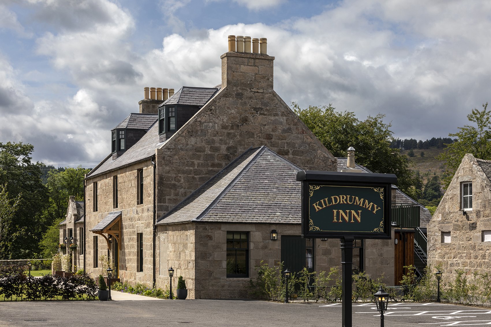 Joelle Reid Interiors_Kildrummy Inn_Exterior with sign 17_289A1261_Photograph by Angus Bremner©_Straightened.jpg