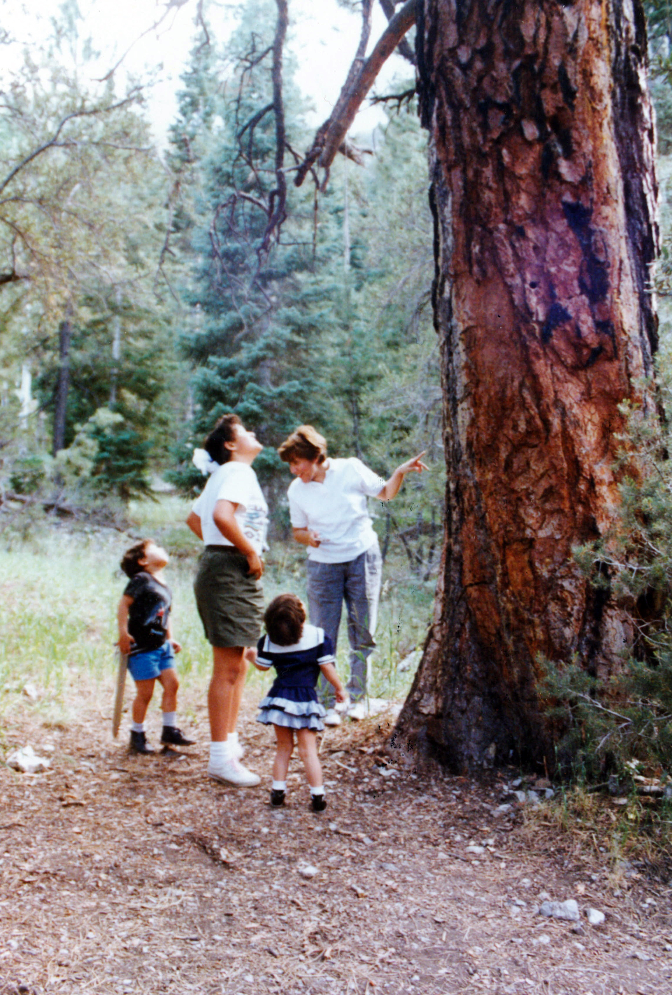 Christian with his sister, aunt, and cousin