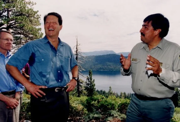 Juan Palma with Vice President Al Gore during the 1997 presidential visit to lake tahoe, ca. Nevada senator harry reid looks on.