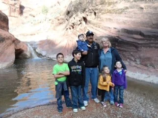 Juan and Susan Palma hiking the Red Cliffs National Conservation Area with five of their grandchildren. BLM Saint George Field Office, Utah.