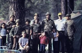 William Contreras (3rd from right) with his family and family friends enjoying a camping trip