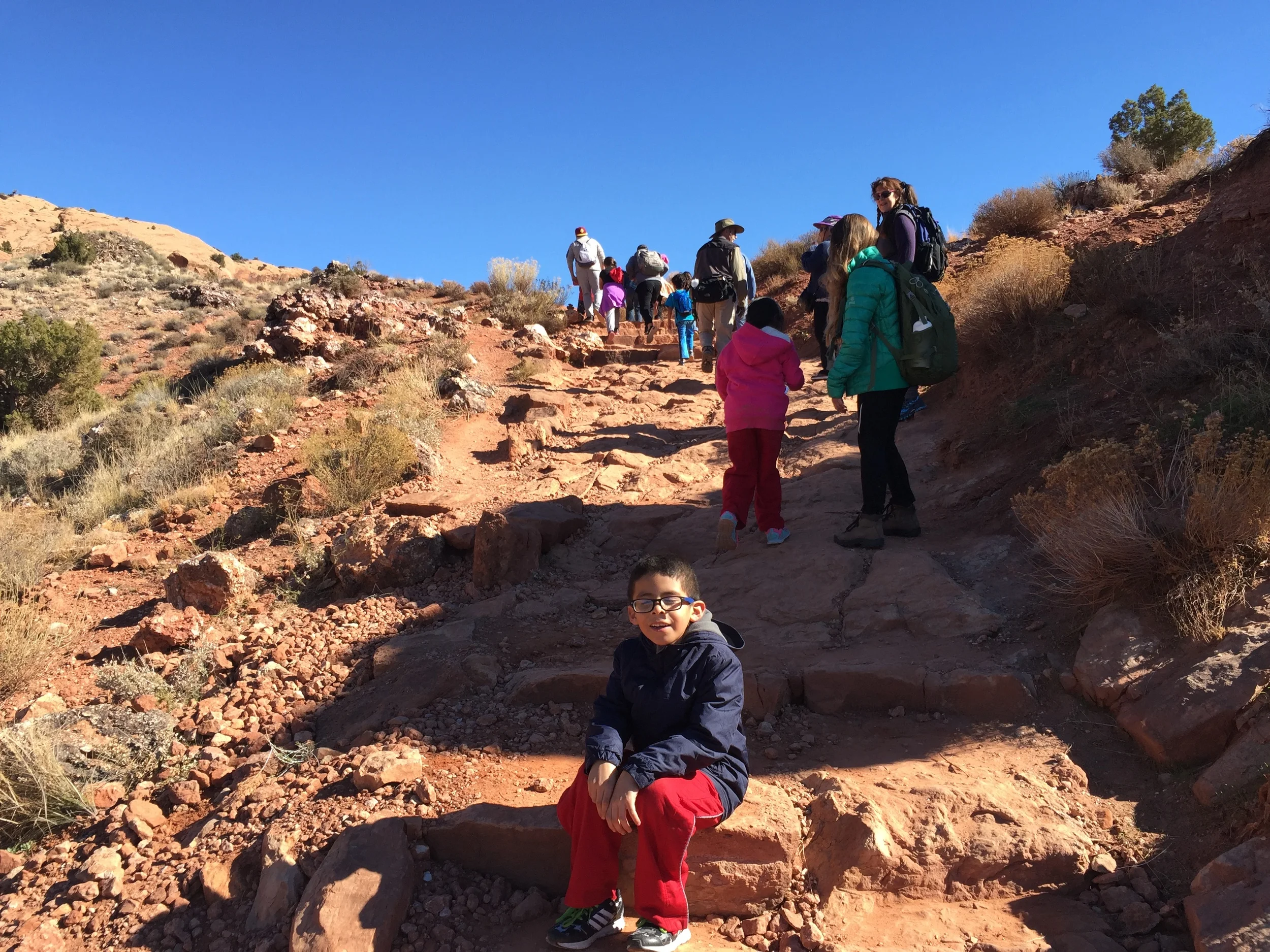 Juan Palma led a hike with kids from moab on the Delicate arch trail and talked about Latino connections to the area. The old spanish trail runs through this same region, and is being considered for protection under a tool called a Master Leasing Plan (MLP).