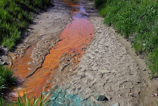 Stream pollution from coal mining waste. The Stream Protection Rule would have regulated the dumping of waste from coal mining into streams, but it was overturned by Congress in early 2017. Photo by Matt Wasson CC By 2.0-- https://www.flickr.com/photos/nationalmemorialforthemountains/4534741523