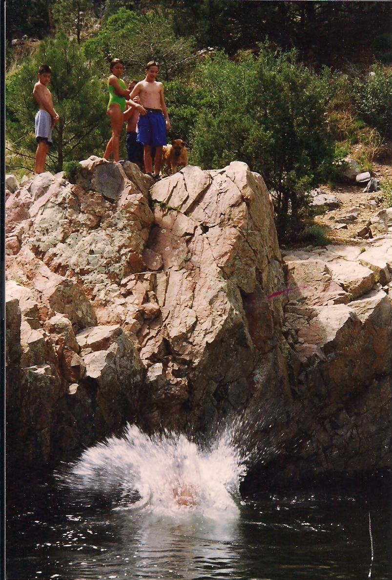 Kids jumping into the Pecos River 