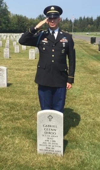 Sgt Eric Sakuma salutes his battle buddy again.