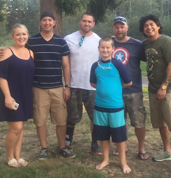 Young Gabriel and his mother Hannah meet his dad Gabe's battle buddies after ten years. L to R: Hannah (De Roo) Clark, Eric Sakuma, Jon Stuart, Gabriel De Roo II, Greg Savage, Steven Montanio.