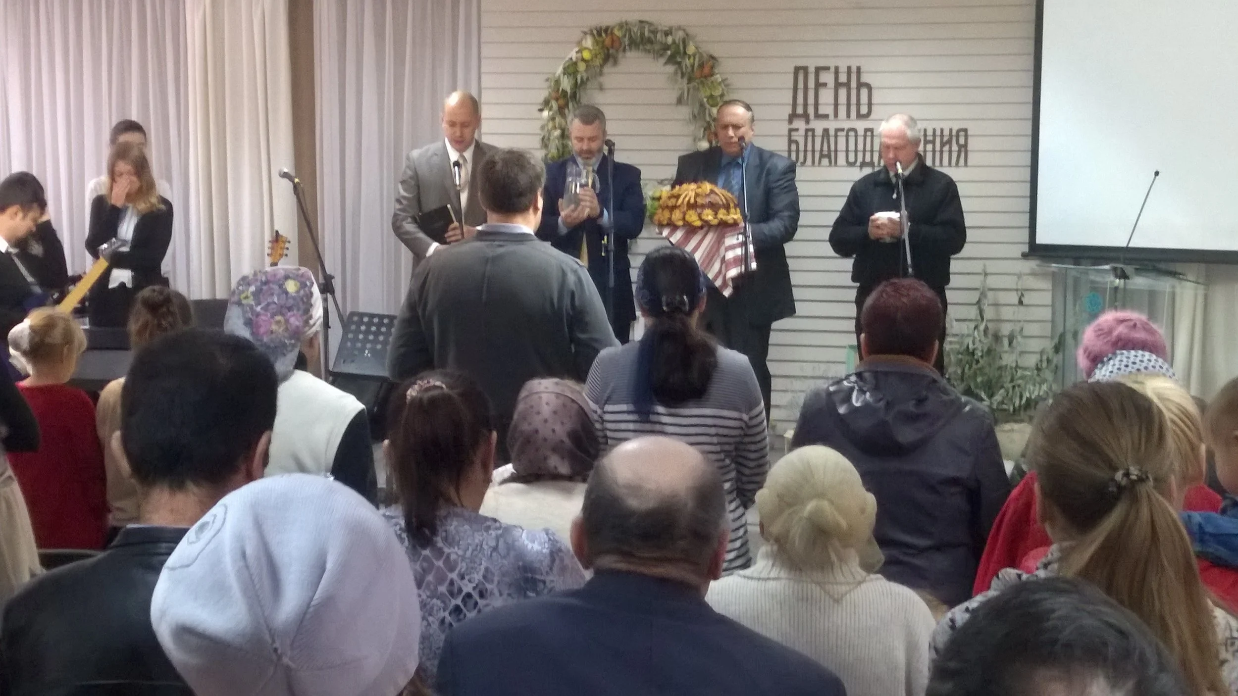 Pastors thanking the Lord for the harvest.