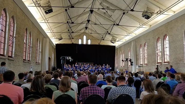 Opening session of conference in the overflow hall where German was translated to English for us. Over 1,000 church leaders from Europe and around the world attended.