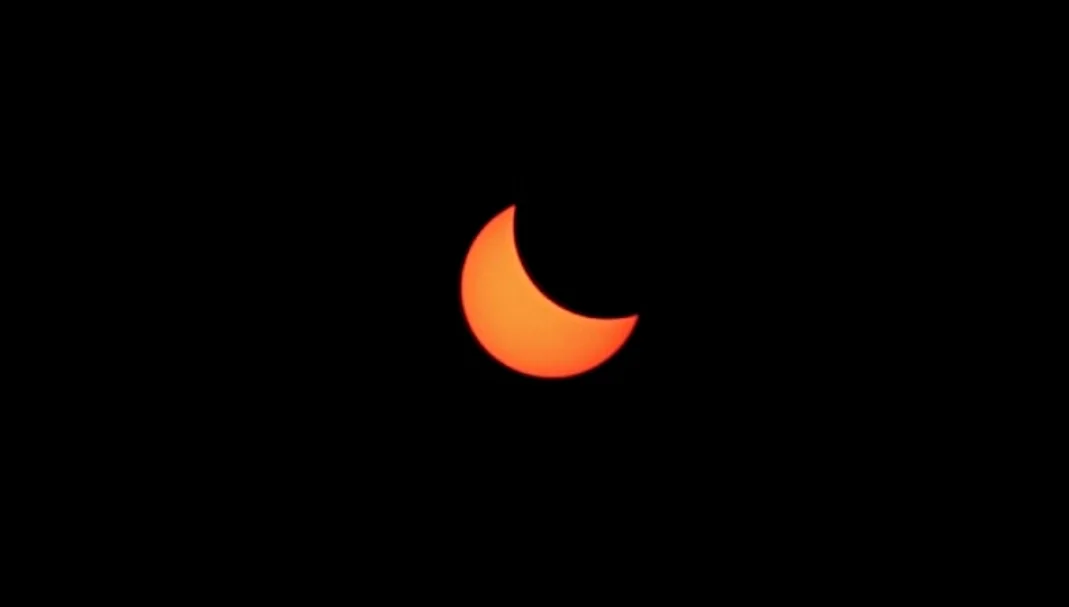  The solar eclipse photographed from our home.