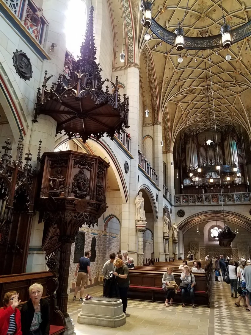Luther's castle church with the pulpit he preached from and his remains in the white stone box on the floor beneath. 