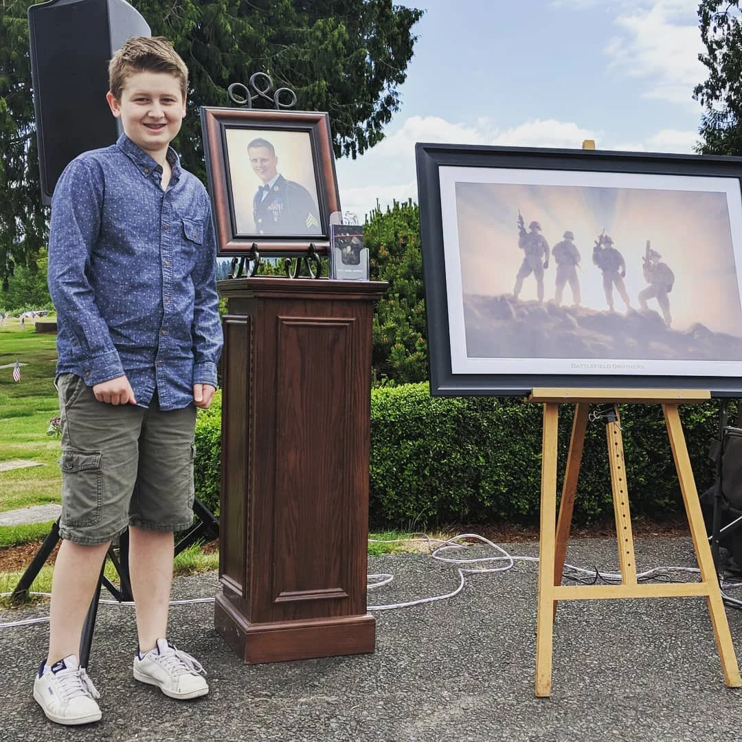Young Gabriel show his resemblance to his father and a recent battle field painting done by his uncle Ezra.