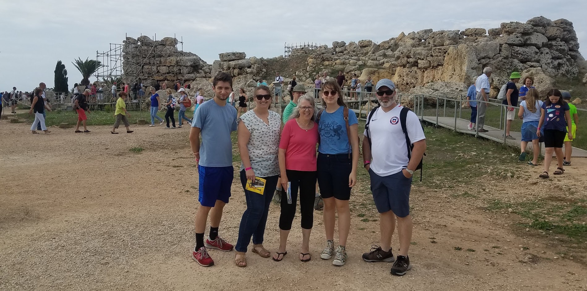 Behind family are the Megalithic Temples of Malta. They are UNESCO World Heritage Sites because they are the oldest free-standing structures in the world built 5,600 years ago. These polytheistic people may have been the ancestors of those Paul encountered. Picture LR: Mishael, Christina, Nancy, Noelle and Caleb Suko.