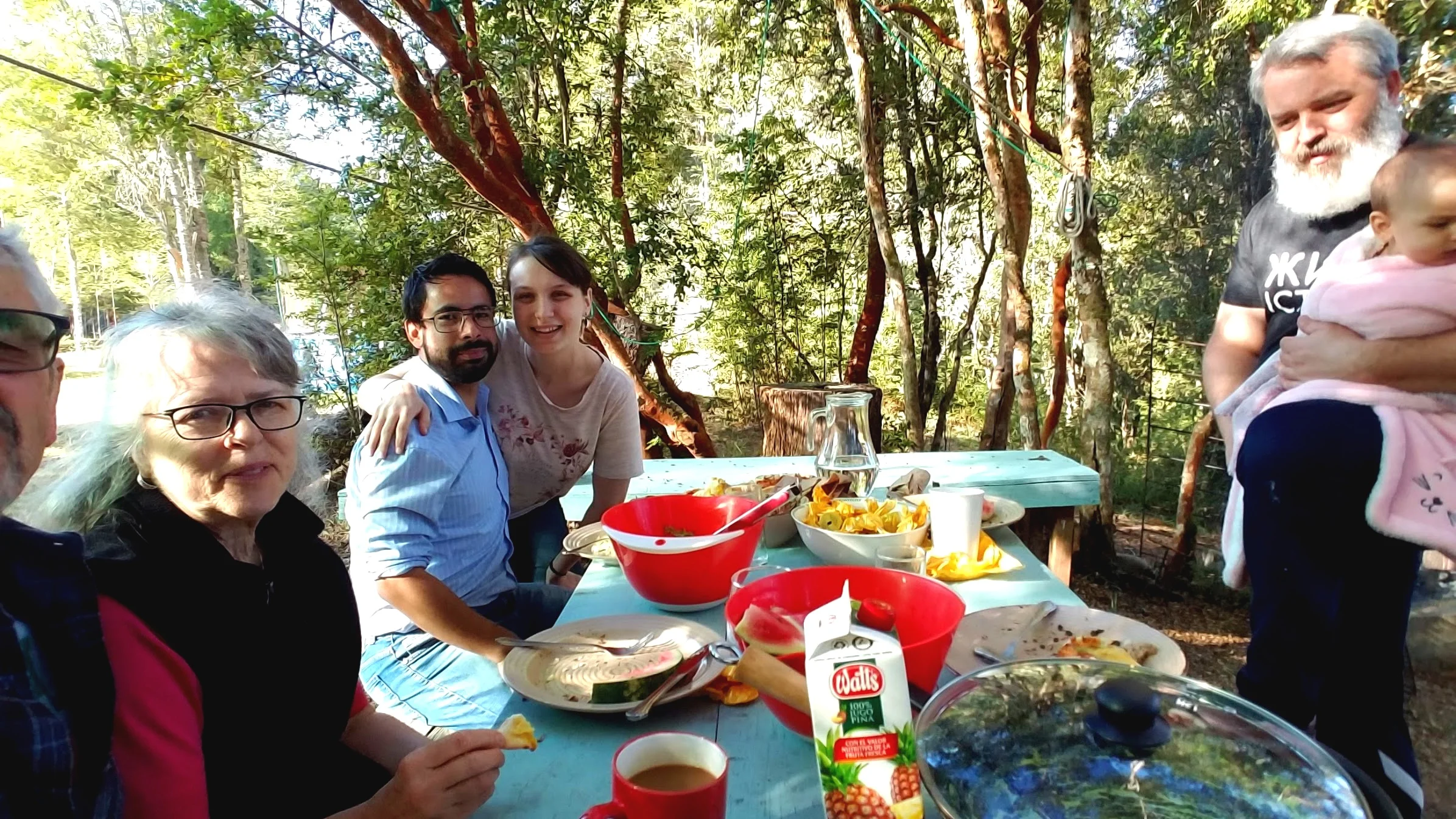 A relaxing lunch outside Naomi and Jorge’s forest cabin with a babbling brook just feet away.
