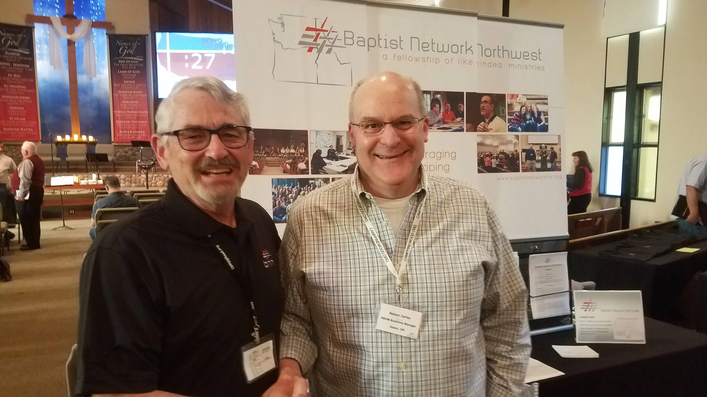 I am standing with Nelson Zarfas our BNN business manager and loan officer last week at our conference in Everett. We so appreciate the work BNN has done to make it possible for us to be able to help cover the cost of building. By the way, thanks to them for the free BNN polo shirt too. :-)