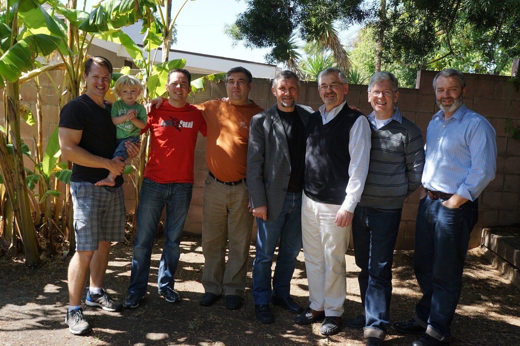 ABOVE: In LA at my son Ezra’s home a few years ago during a Shepherd’s Conference with some of our guys and Pastor Fedor Bespalov standing next to me. BELOW: Praying for seven Ukrainian leaders who came through Russian check points safely in the Donetsk Region to the conference at Pastor Bespalov’s Light of the Gospel Church.