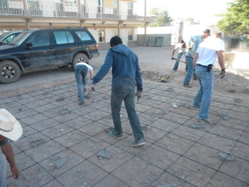 Team preparing ground to pour cement