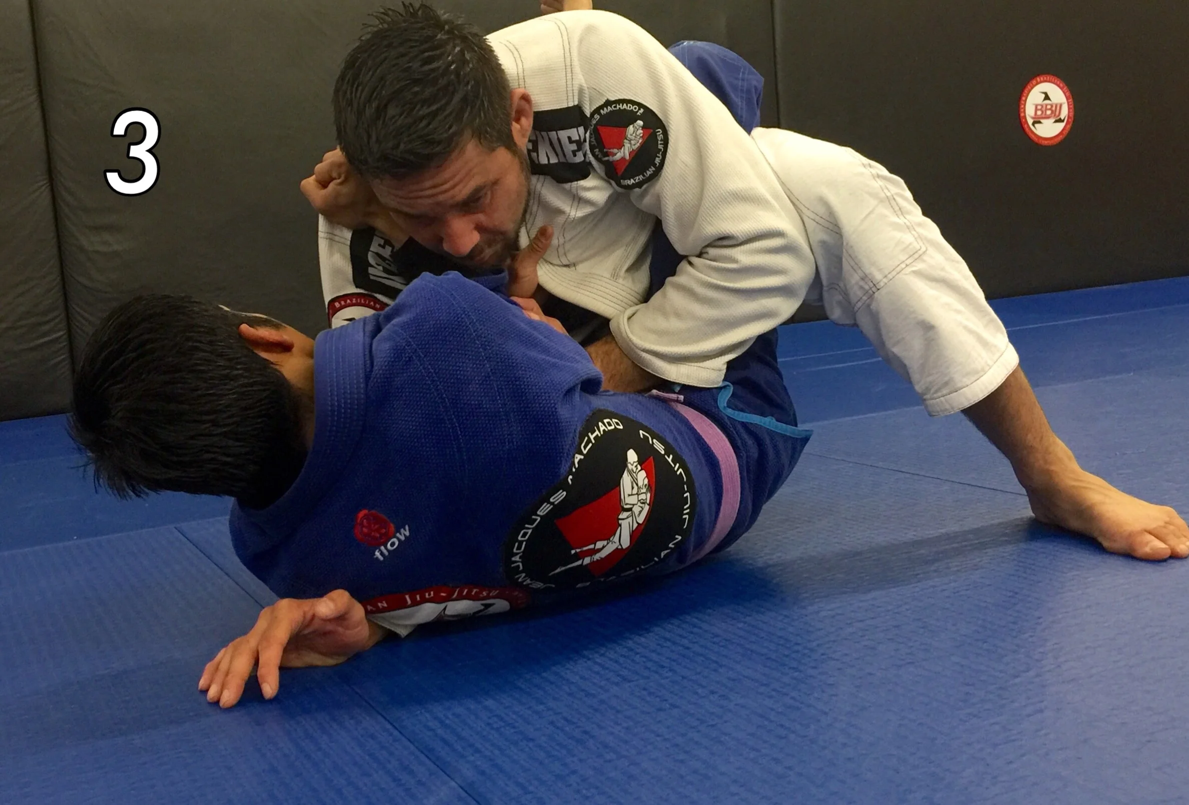 Use your knee to push against your elbow and post your hand against your opponent's upper arm. With both your leg and arm working together your opponent's arm can not apply pressure for the cross choke. You have crushed the choke. Photo credit: Justin Agee