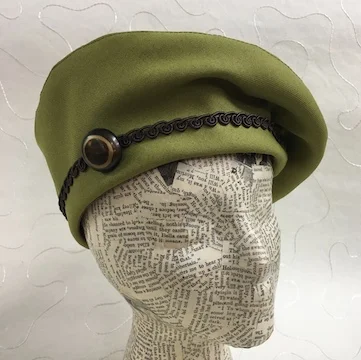 Flat pattern beret with vintage button.