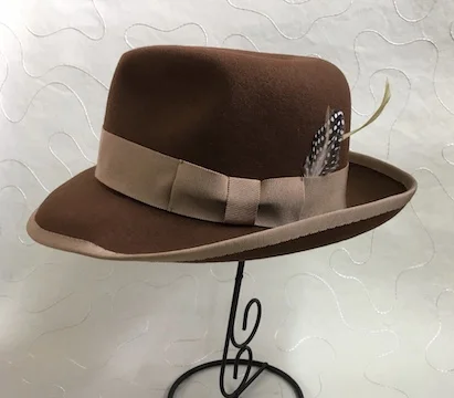 Fur felt blocked fedora.