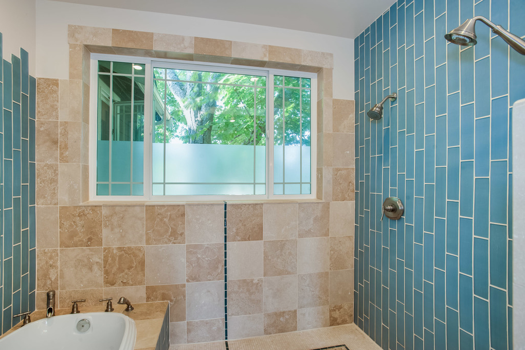 Inside the shower there are two shower heads