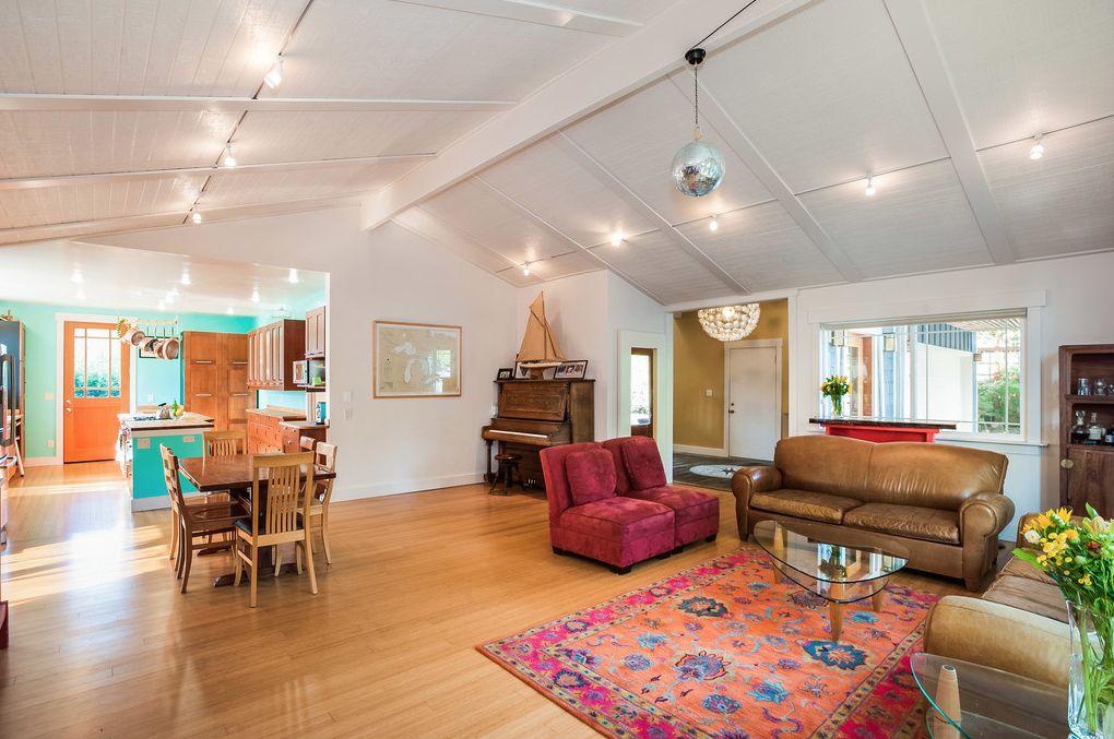 New Kitchen addition is seen opening onto Living Room- see same wall below: