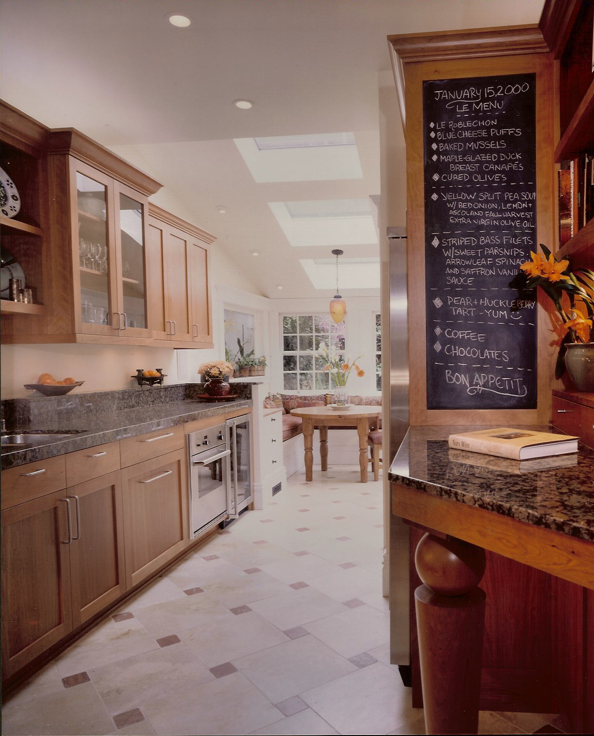 The clients wanted a blackboard and desk in the kitchen.
