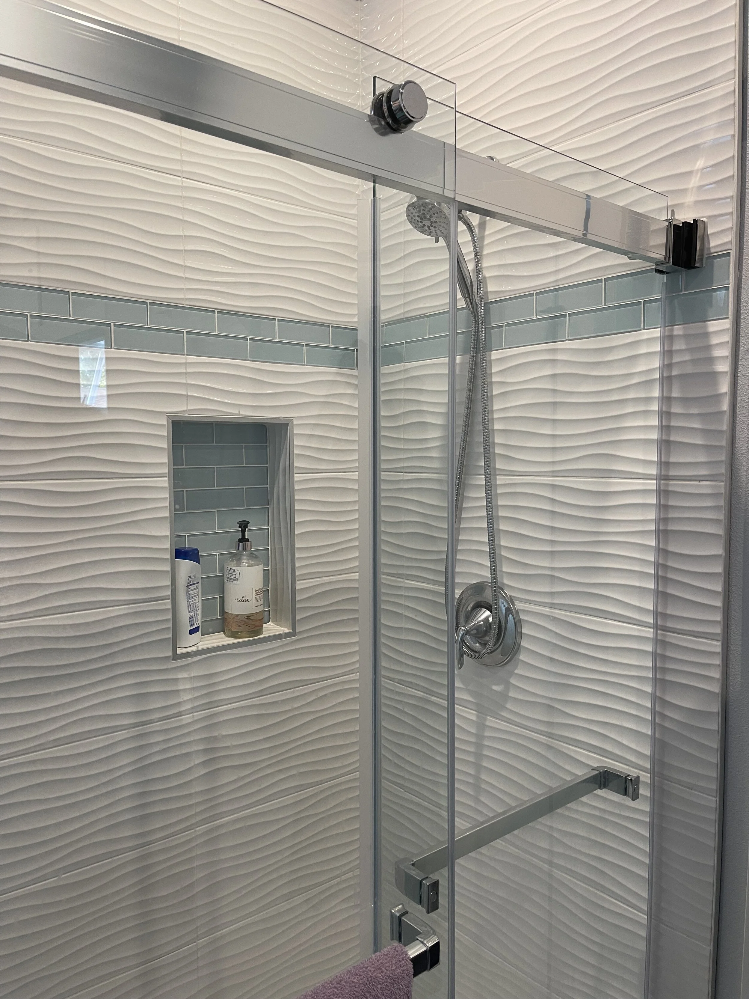 I have been getting comments from contractors, that these new “Wavy Tiles” do not work in bathroom because you can’t get a smooth surface to mount the fixtures onto. Here is proof positive that Wavy Tiles do work! They add a nice dimension in shadow…