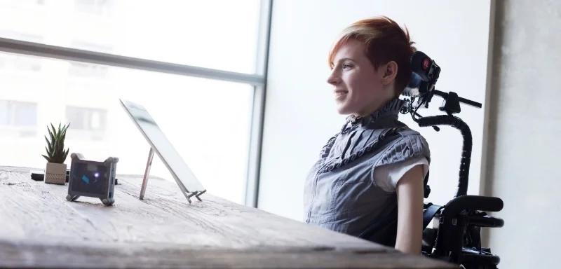 Carolyn Pioro using Tecla to access her iPad. Image via gettecla.com.