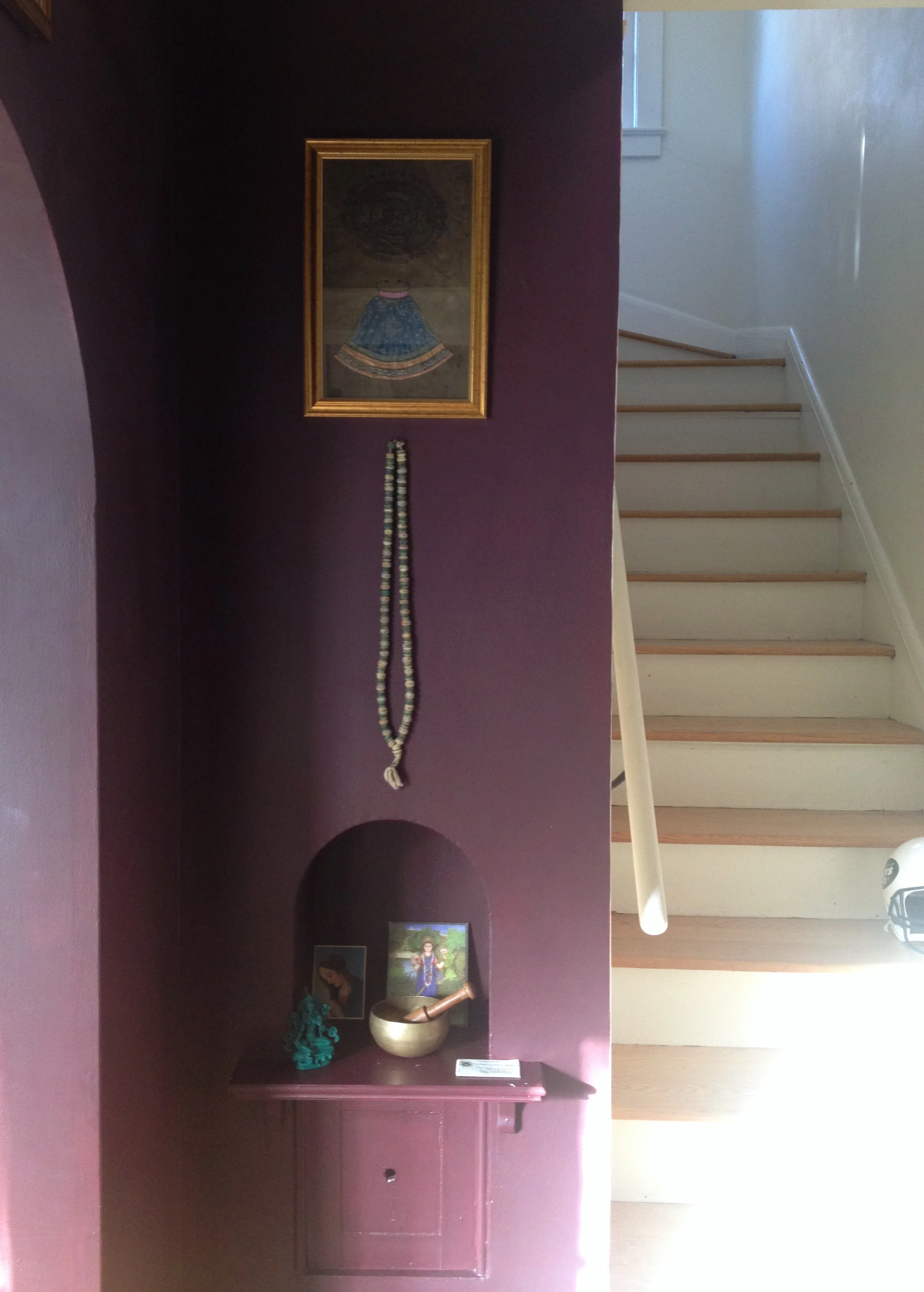 Evocative depth is added via Farrow & Ball's "Brinjal" paint. I added some beloved soulful possessions of the owners to inspire a sacred pause within the velocity of their daily life.