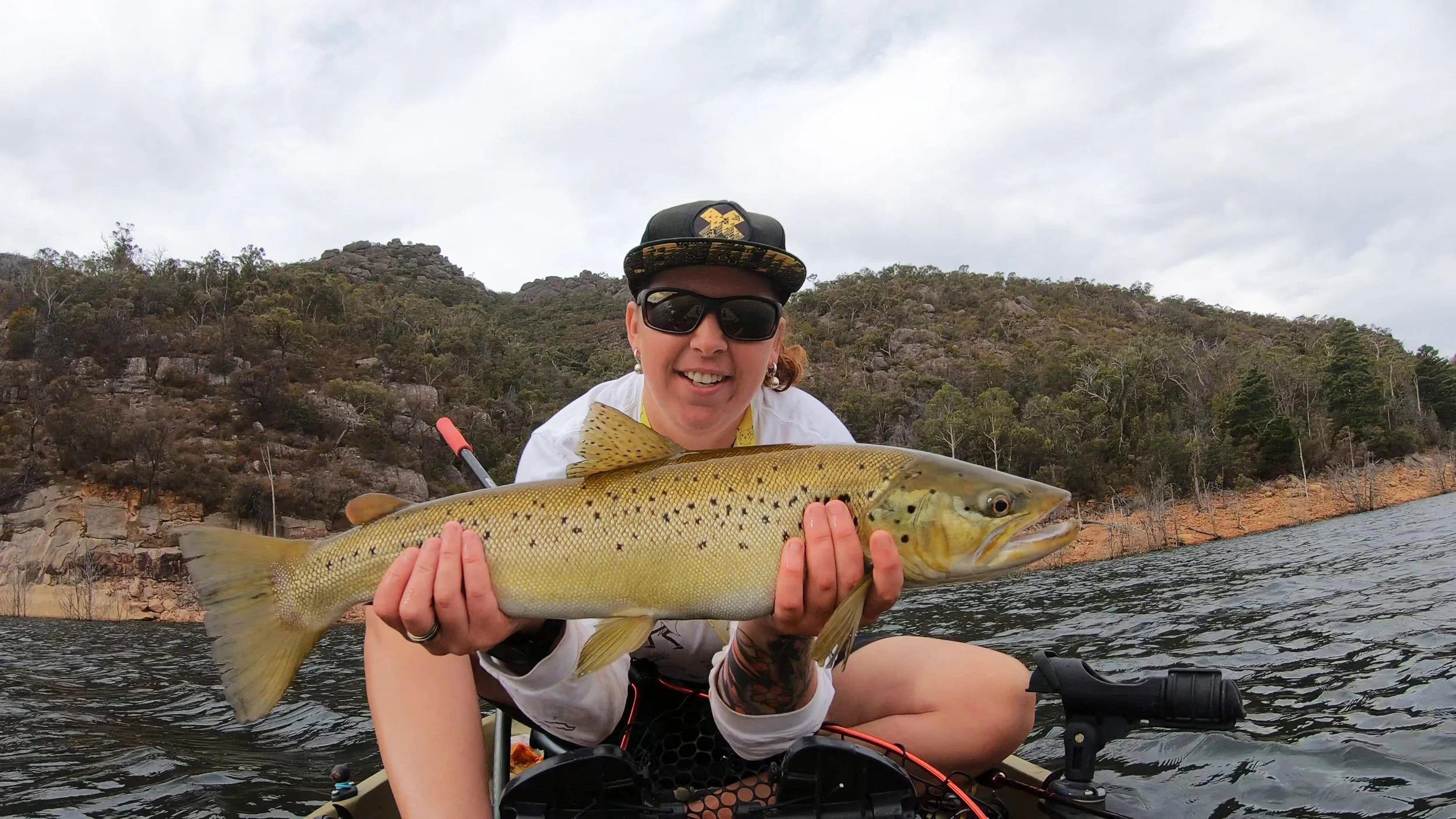 Local kayak guru Robyn with a monster brown out of Lake Bellfield.