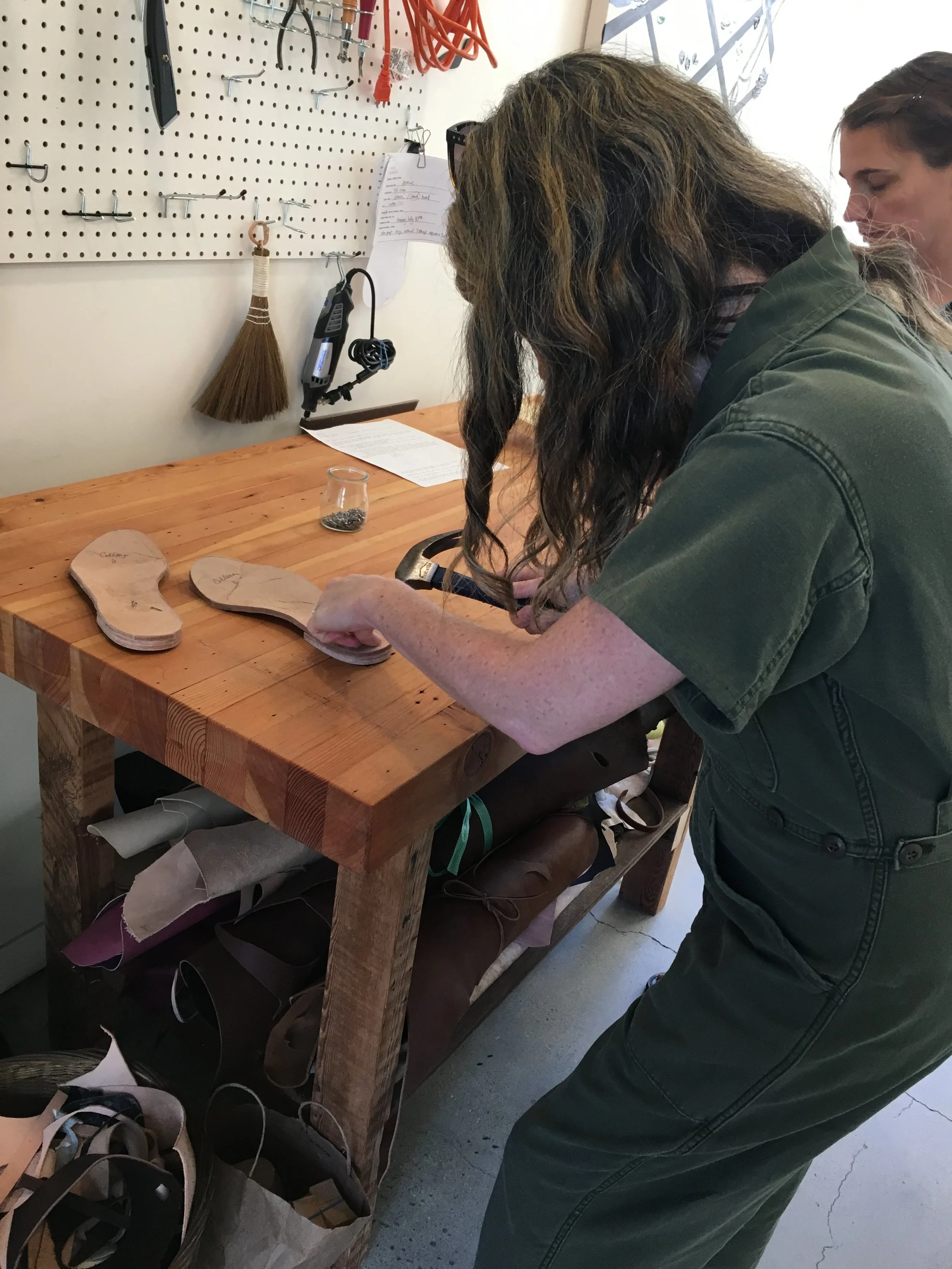   Start with a leather outsole, cut to your preferred size &amp; shape. Dampen the soles with water to mold &amp; shape the arch support  Allow the outsoles to dry, and attach a stacked leather heel &nbsp; 