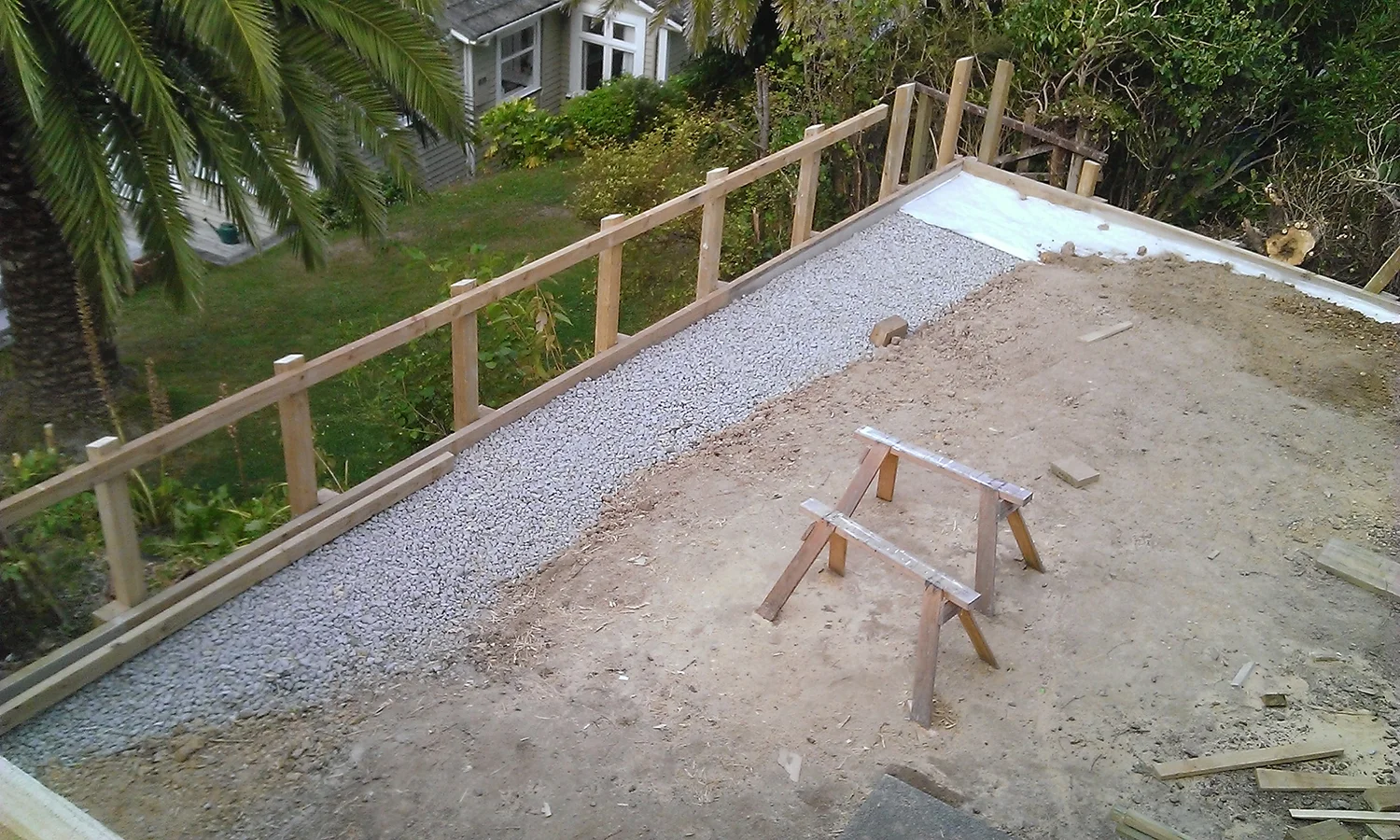  2.3 Retaining wall complete fence construction underway 