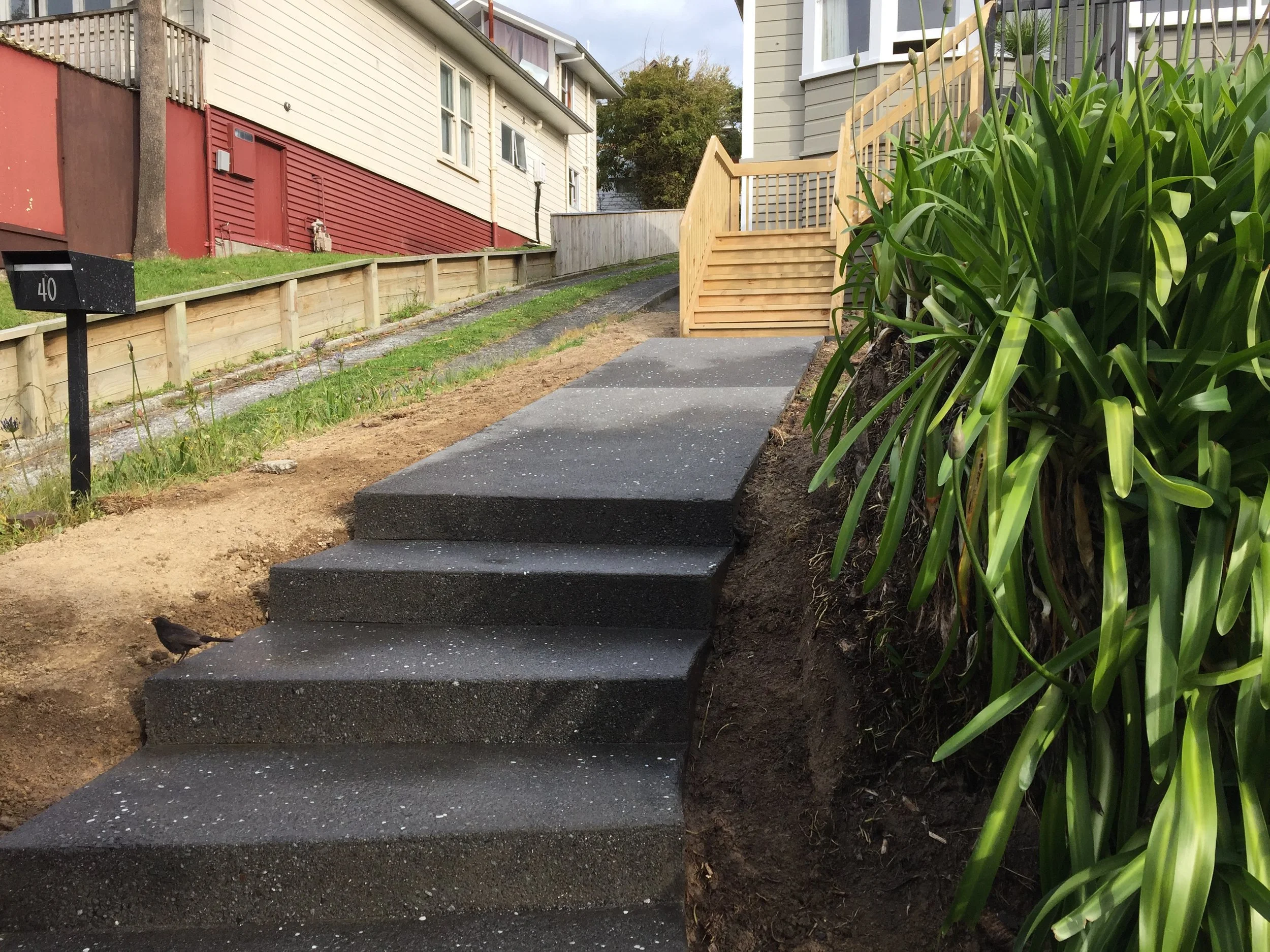   Wooden stairs and exposed aggregate steps &amp; path all by Groundplanz  