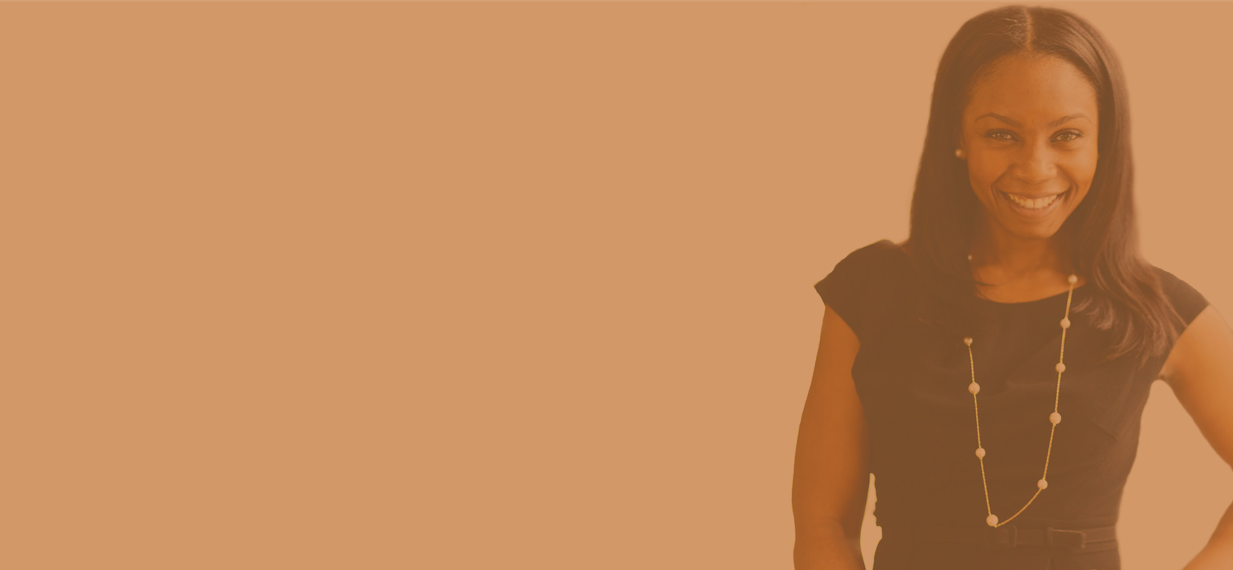 Headshot_revised_orange.jpg