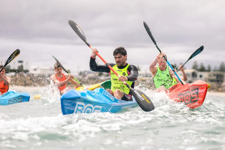 Surf lifesaving athlete competing in a single ski race