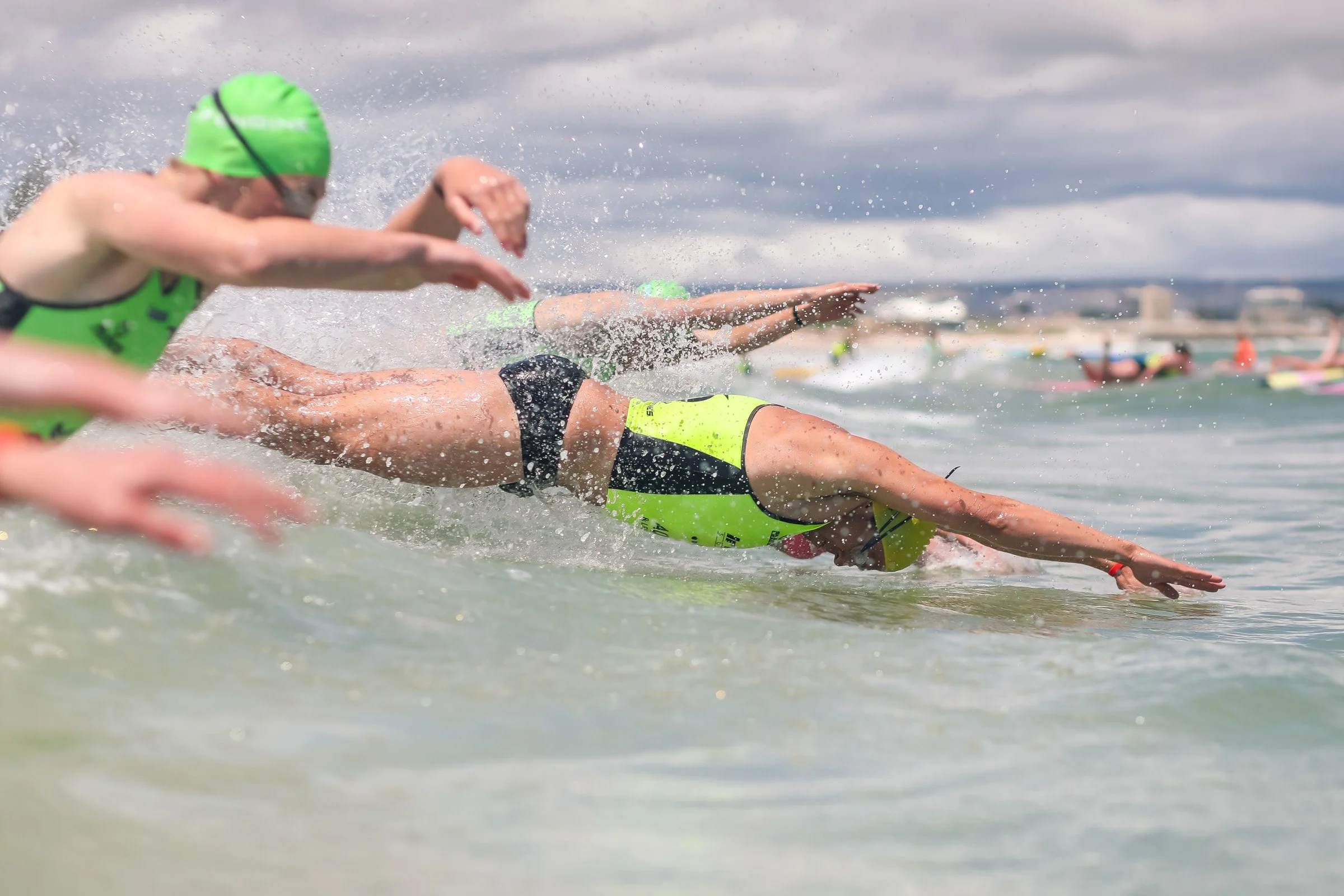 Surf lifesaving athletes competing in a surf race