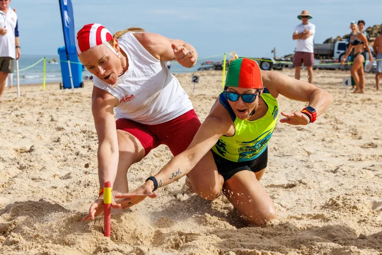 Surf lifesaving athletes competing in beach flags