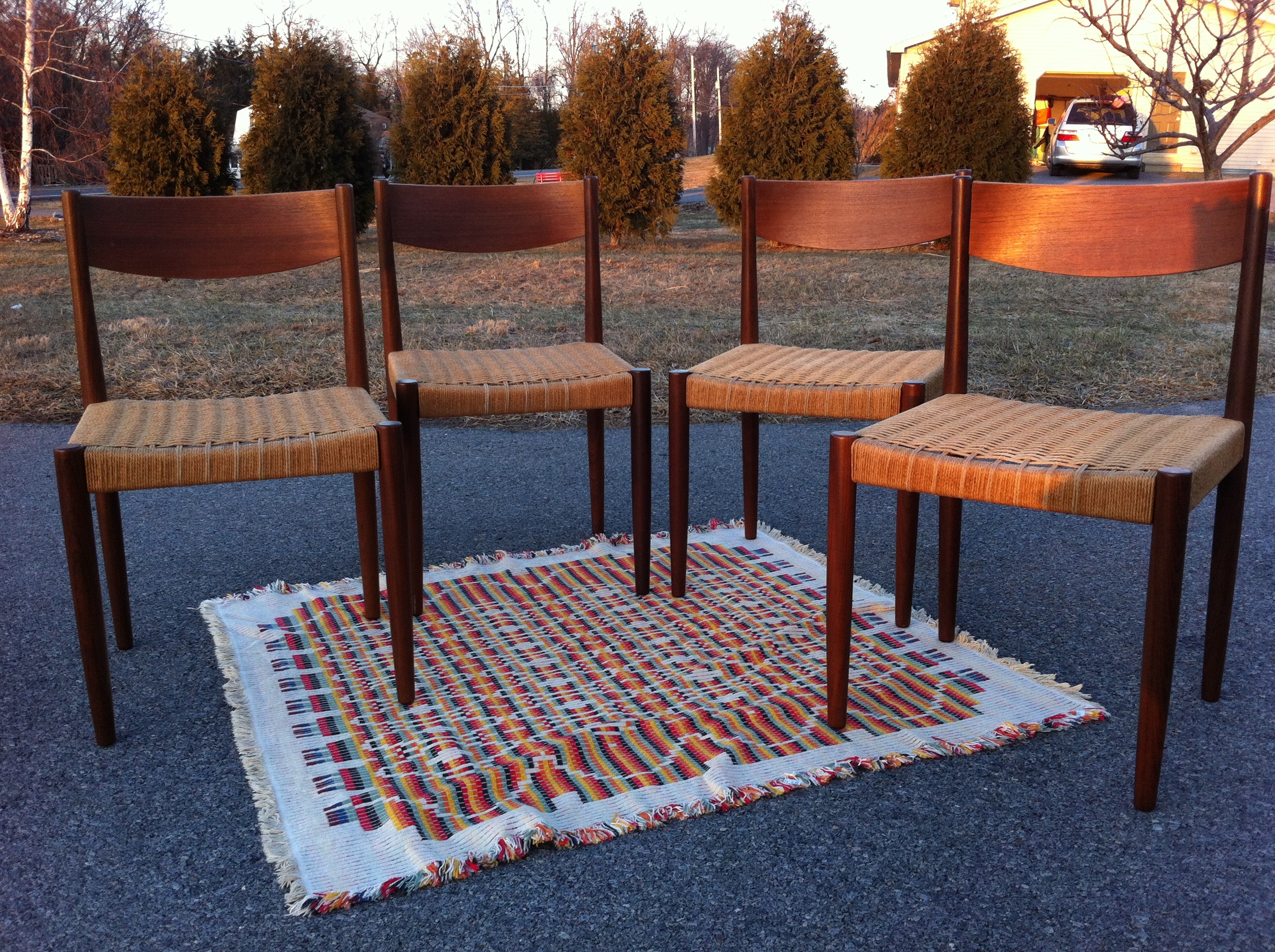 Aren't they beautiful!? These chairs turn up fairly frequently. I do believe there were at least 2 finishes available as I have seen them in a lighter blonde, this teak and possibly a darker rosewood. There is also a variation with vinyl seats. They do not even compare to the awesomeness of the paper cord, in my opinion. Also note that there were Malaysian made copies of this chair so make sure if you look for them you find Danish Control stickers on them!
