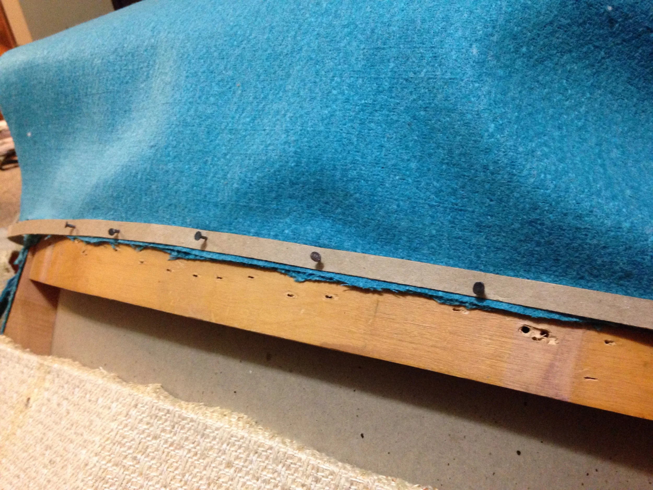 Here is where I used the cardboard strip 3/8" to be exact. The fabric panel then pulls down over for a perfect finish.