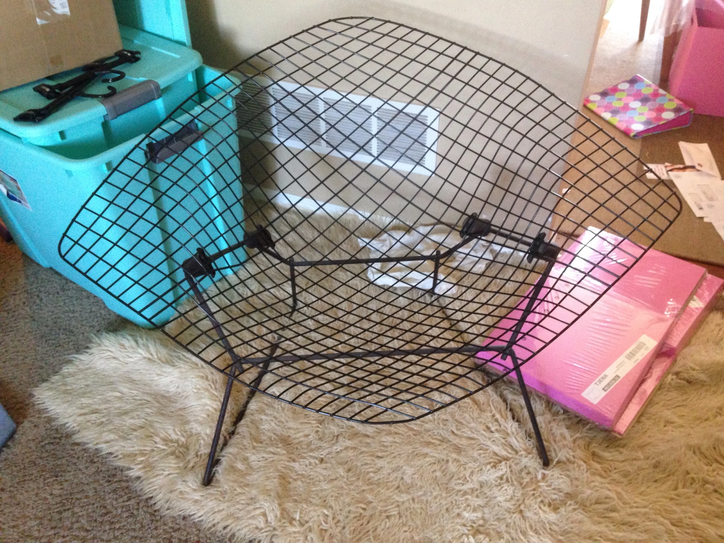 This chair is actually wider than it looks. I have been using without the cover and just have a deer skin thrown over it. I like the openness of it. When the cover it on, it totally changes the look of it. Not airy like it is here.