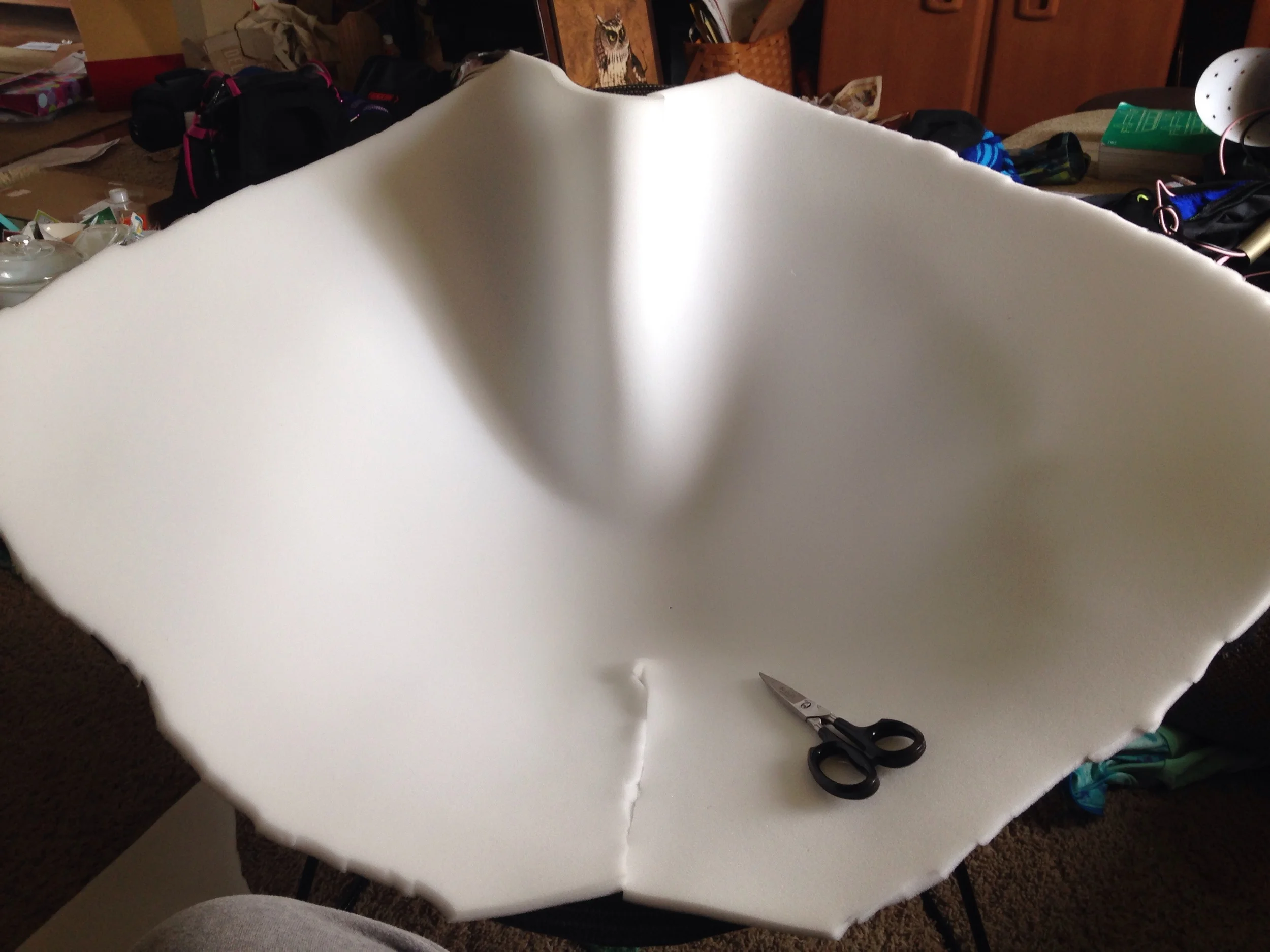 Removing the foam excess to contour the seat.