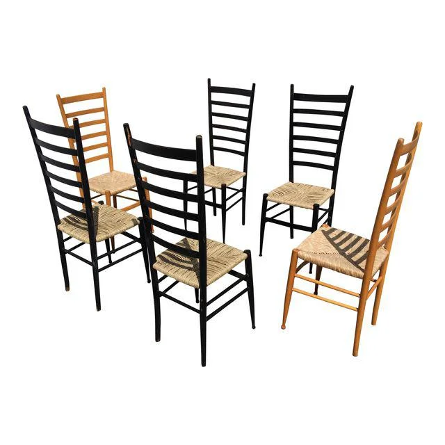 Amazing set of 6 Italian ladder back chairs, all new seats on the black chairs in sea grass. This was a fun and labor intensive repair job. I love the chairs! They look great with a blonde dining table I found, see the listing for pics! I would gladly make you a great deal if you purchase the entire set!
