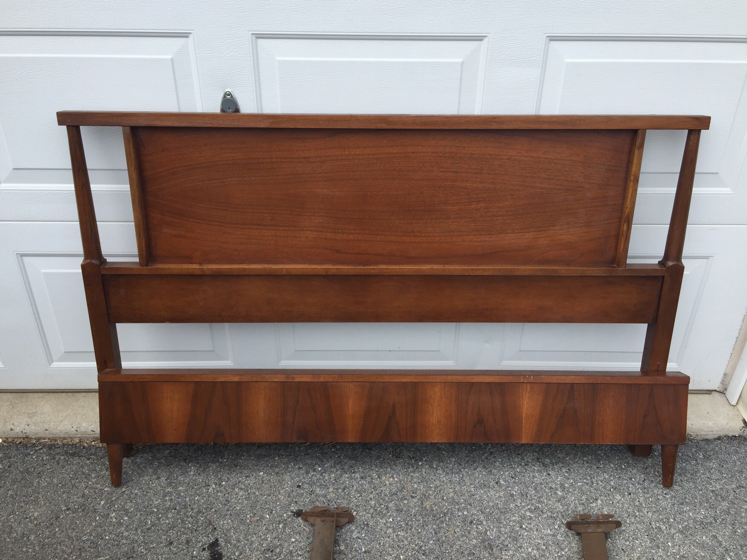 Walnut fUll bed. Can be modified easily for queen. Has headboard, footBoard and i do have the side rails. Will be cheaper to ship without buy that is up to you. This one just listed on etsy and coming to chairish.
