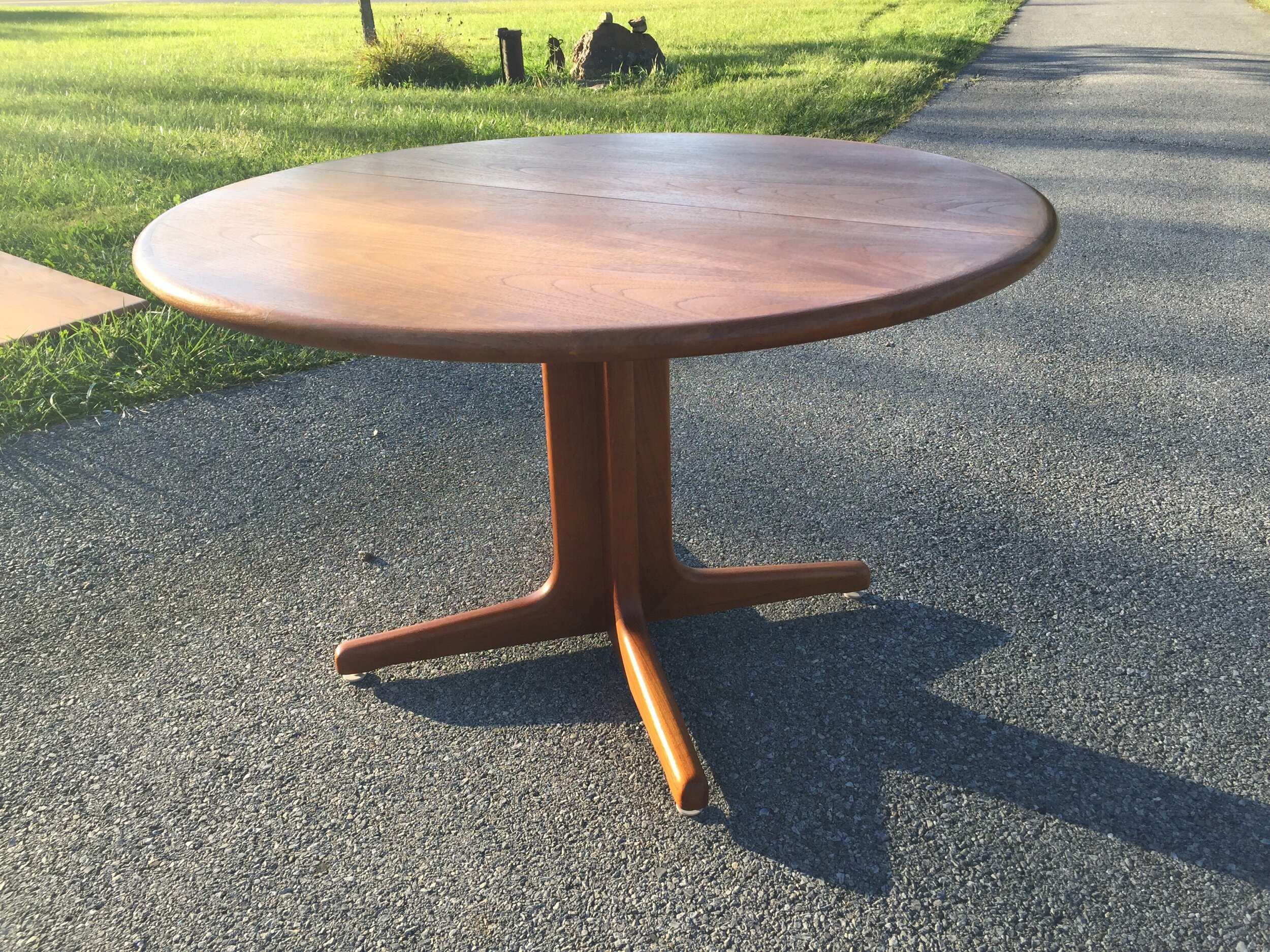 The table is iT’s shorter configuration is A great size in a small room.