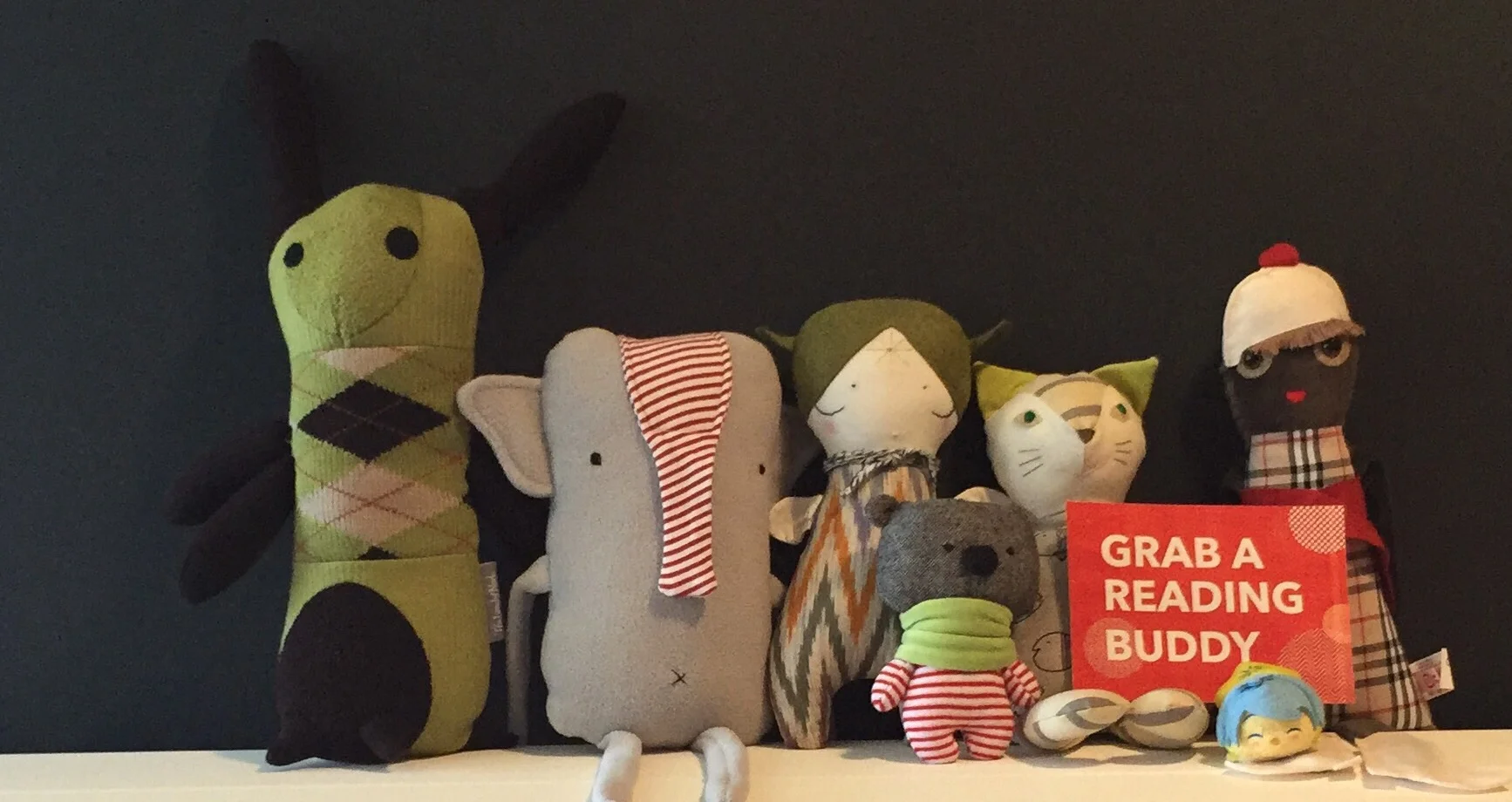 From left to right: sock monster , elephant, fairy baby doll , joyful cat , mini bear, girl Lisa , Joy
