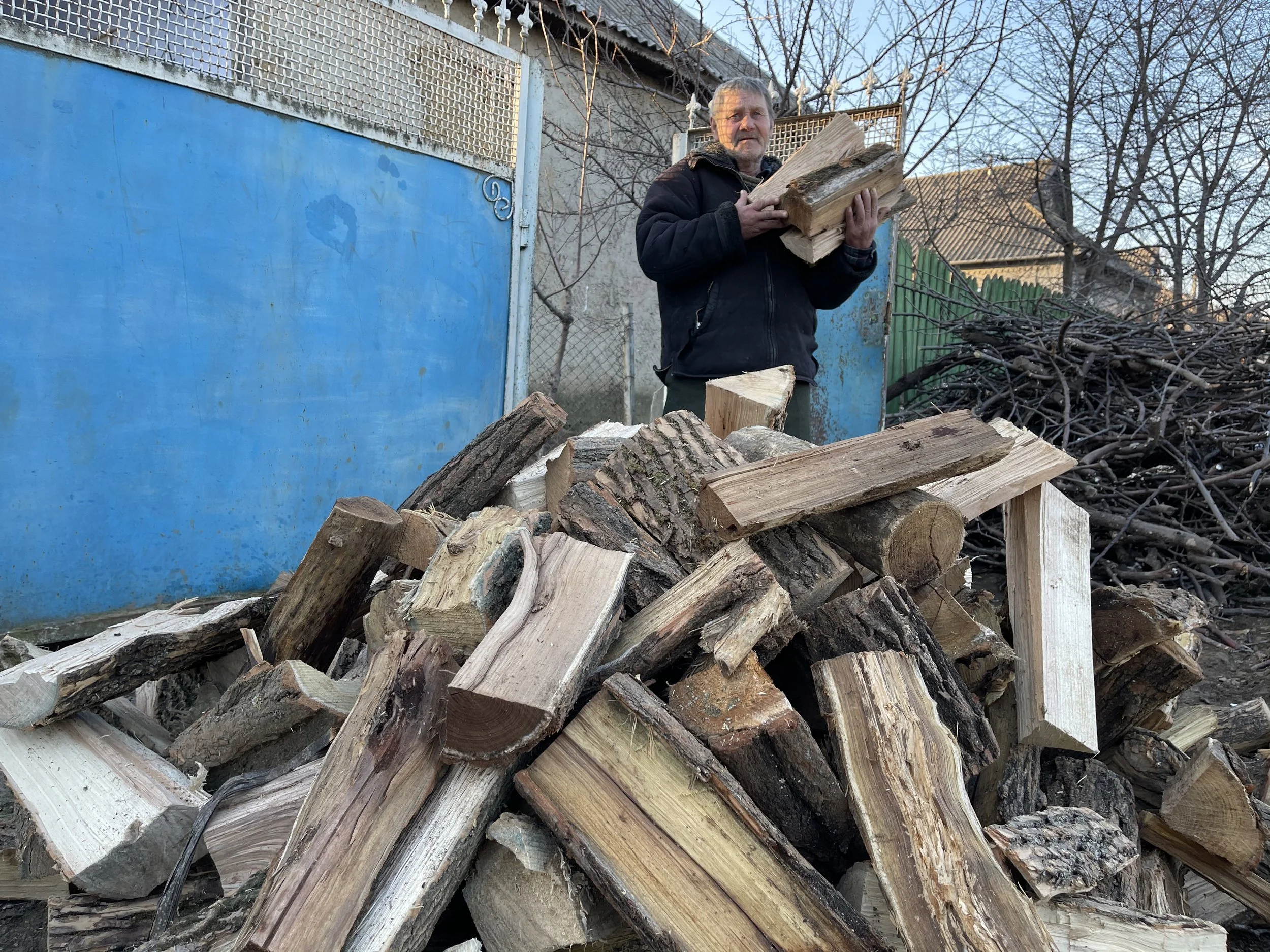 man with firewood.jpeg