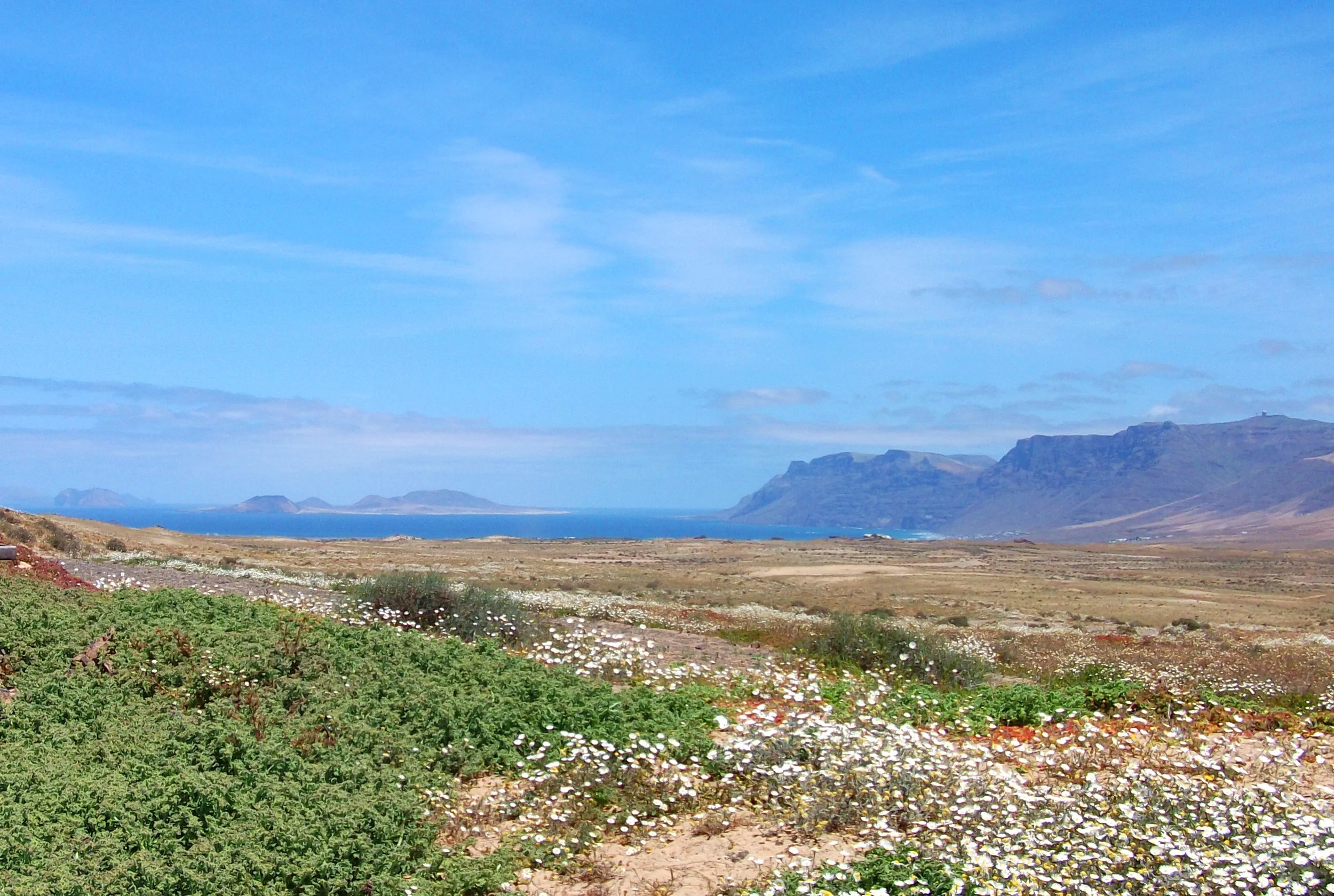This is the vast vista of natural park enjoyed by the eco cottage accommodation, Jewel of the Sands , with La Graciosa island beyond. Click to inspect this totally restored Lanzarote Finca with its authentic Canarian interiors and relaxing gardens