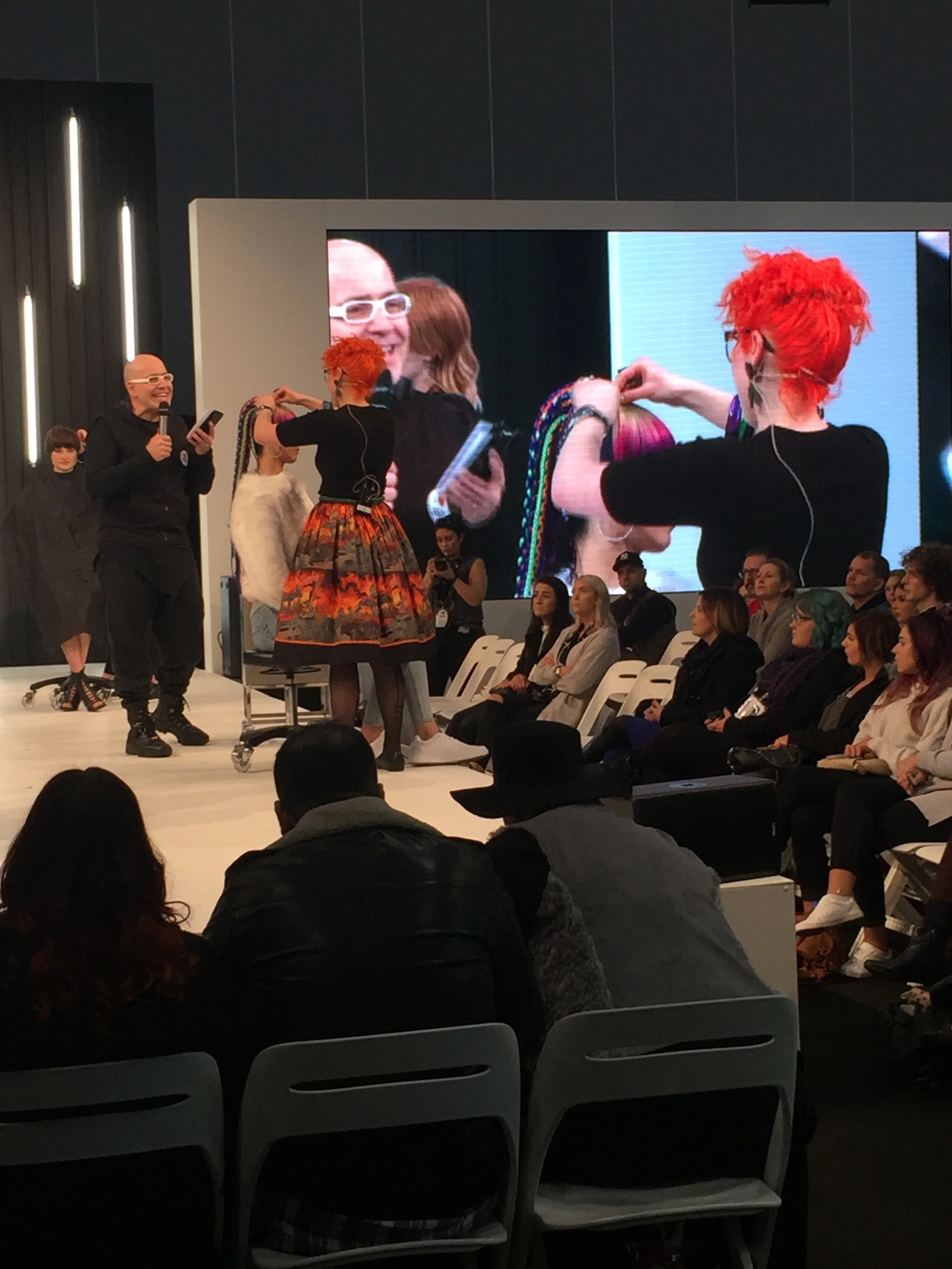 Lousie on main stage with the crowd loving her hair and her fashion sense. 