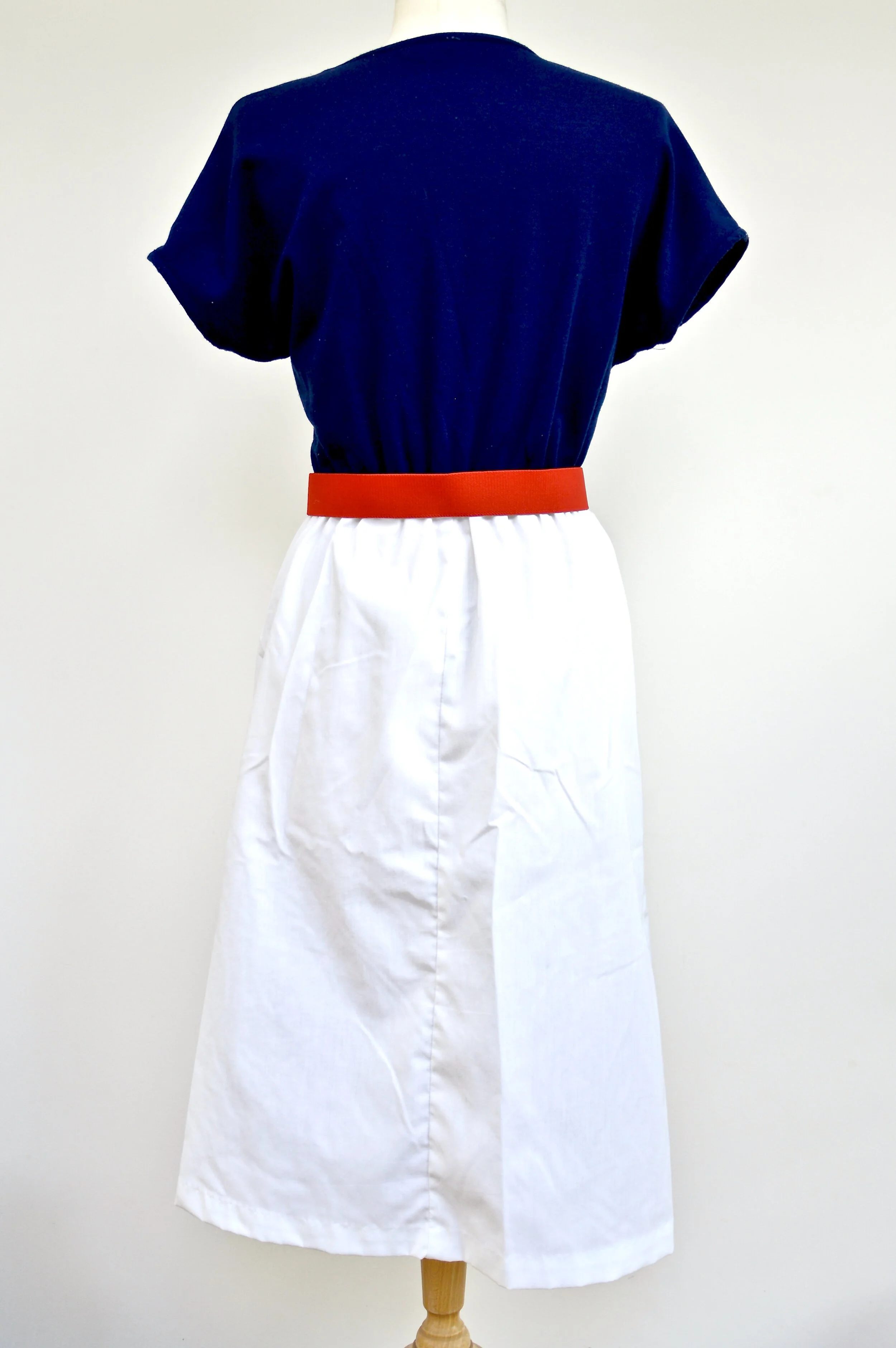 1970s Toni Todd dress with striped red, white yellow, blue skirt